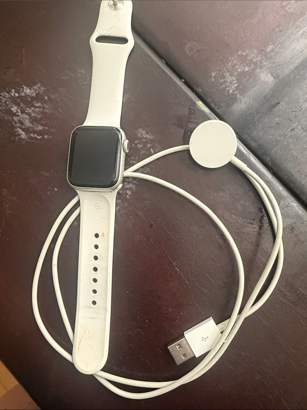 Apple Watch with White Band and White Magnetic Charger